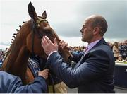 22 May 2016; Trainer Adrian Keatley with Jet Setting after winning the Tattersalls Irish 1,000 Guineas race at the Curragh Racecourse, Curragh, Co. Kildare. Photo by Brendan Moran/Sportsfile