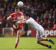 22 May 2016; Ciaran McFaul of Derry in action against Mattie Donnelly of Tyrone during the Ulster GAA Football Senior Championship, Quarter-Final, at Celtic Park, Derry.  Photo by Oliver McVeigh/Sportsfile