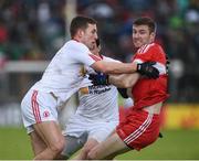 22 May 2016; Niall Holly of Derry in action against Niall Sludden of Tyrone during the Ulster GAA Football Senior Championship, Quarter-Final, at Celtic Park, Derry.  Photo by Oliver McVeigh/Sportsfile