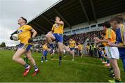 22 May 2016; Roscommon players run onto the pitch ahead of the Connacht GAA Football Senior Championship Quarter-Final, between Roscommon and Leitrim at Páirc Seán Mac Diarmada in Carrick-on-Shannon, Co. Leitrim. Photo by Ramsey Cardy/Sportsfile