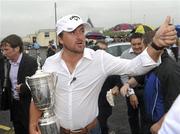 23 June 2010; Golfer Graeme McDowell with the US Open Championship trophy on his return home following his victory in Pebble Beach, California, last weekend. Rathmore Golf Club, Portrush, Co. Antrim. Picture credit: Oliver McVeigh / SPORTSFILE