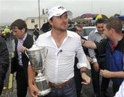 23 June 2010; Golfer Graeme McDowell with the US Open Championship trophy on his return home following his victory in Pebble Beach, California, last weekend. Rathmore Golf Club, Portrush, Co. Antrim. Picture credit: Oliver McVeigh / SPORTSFILE
