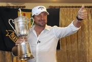 23 June 2010; Golfer Graeme McDowell with the US Open Championship trophy during a press conference on his return home following his victory in Pebble Beach, California, last weekend. Rathmore Golf Club, Portrush, Co. Antrim. Picture credit: Oliver McVeigh / SPORTSFILE