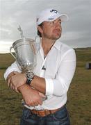 23 June 2010; Golfer Graeme McDowell with the US Open Championship trophy on his return home following his victory in Pebble Beach, California, last weekend. Rathmore Golf Club, Portrush, Co. Antrim. Picture credit: Oliver McVeigh / SPORTSFILE