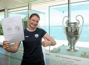 24 June 2010; Republic of Ireland's Aileen Gilroy, from Killala, Co. Mayo, alongside the UEFA Champions League trophy, after completing her Leaving Certificate. Aileen today sat her Agricultural Science examination at UEFA Headquarters, Nyon, Switzerland, ahead of Saturday's UEFA Women's Under 17 Championship Final against Spain. UEFA Headquarters, Nyon, Switzerland. Picture credit: Stephen McCarthy / SPORTSFILE