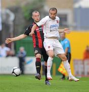 25 June 2010; Fahrudin Kuduzovic, Dundalk, in action against Mark Quigley, Bohemians. Airtricity League Premier Division, Bohemians v Dundalk, Dalymount Park, Dublin. Photo by Sportsfile