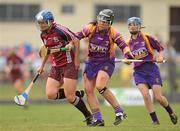 26 June 2010; Una Leacy, Wexford, in action against Emma Kilkelly, Galway. Gala All-Ireland Senior Camogie Championship, Galway v Wexford. Kenny Park, Athenry, Co Galway. Picture credit: Diarmuid Greene / SPORTSFILE
