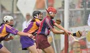 26 June 2010; Therese Maher, Galway, in action against Josie Dwyer and Mary Leacy, left, Wexford. Gala All-Ireland Senior Camogie Championship, Galway v Wexford. Kenny Park, Athenry, Co Galway. Picture credit: Diarmuid Greene / SPORTSFILE