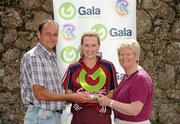 26 June 2010; Galway's Aislinn Connolly is presented with the Gala Performance Award by Tom Hardiman, Gala Regional Manager, left, and Joan O'Flynn, President, Cumann Camogaiochta na nGael. Gala All-Ireland Senior Camogie Championship, Galway v Wexford. Kenny Park, Athenry, Co Galway. Picture credit: Diarmuid Greene / SPORTSFILE