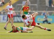 26 June 2010; Cathal McKeever, Derry, in action against Alan Curran, Carlow. GAA Football All-Ireland Senior Championship Qualifier Round 1, Carlow v Derry, Dr. Cullen Park, Carlow. Photo by Sportsfile