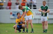 26 June 2010; Brian O'Connor, Offaly, shakes hands with Gary Brennan, Clare, at the final whistle. GAA Football All-Ireland Senior Championship Qualifier Round 1, Offaly v Clare, O'Connor Park, Tullamore, Co. Offaly. Picture credit: Brendan Moran / SPORTSFILE