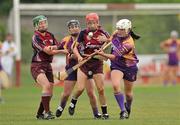 26 June 2010; Mary Leacy, supported by Michelle O'Leary, Wexford, in action against Therese Maher, supported by Orla Kilkenny, Galway. Gala All-Ireland Senior Camogie Championship, Galway v Wexford. Kenny Park, Athenry, Co Galway. Picture credit: Diarmuid Greene / SPORTSFILE