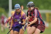 26 June 2010; Katriona Parrock, Wexford, in action against Sinead Keane, Galway. Gala All-Ireland Senior Camogie Championship, Galway v Wexford. Kenny Park, Athenry, Co Galway. Picture credit: Diarmuid Greene / SPORTSFILE