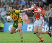26 June 2010; Michael Murphy, Donegal, in action against Brendan Donaghy, Armagh. GAA Football All-Ireland Senior Championship Qualifier Round 1, Armagh v Donegal, Crossmaglen, Co. Armagh. Picture credit: Oliver McVeigh / SPORTSFILE