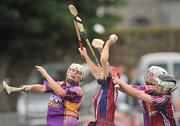 26 June 2010; Therese Maher, Galway, wins possession ahead of Mary Leacy, Wexford. Gala All-Ireland Senior Camogie Championship, Galway v Wexford. Kenny Park, Athenry, Co Galway. Picture credit: Diarmuid Greene / SPORTSFILE