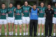 26 June 2010; Dermot Earley, 9, Kildare, stands with his team manager Kieran McGeeney and team mates during the National Anthem. GAA Football All-Ireland Senior Championship Qualifier Round 1, Kildare v Antrim, St Conleth's Park, Newbridge, Co. Kildare. Picture credit: Matt Browne / SPORTSFILE