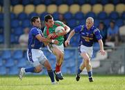 26 June 2010; Alan Freeman, Mayo, in action against Shane Mulligan, left, and Dermot Brady, Longford. GAA Football All-Ireland Senior Championship Qualifier Round 1, Longford v Mayo, Pearse Park, Longford. Picture credit: Ray McManus / SPORTSFILE