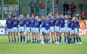 26 June 2010; The Longford team stand for the National Anthem after a minute's silence to honour the career of the late Roscommon player Dermot Earley. GAA Football All-Ireland Senior Championship Qualifier Round 1, Longford v Mayo, Pearse Park, Longford. Picture credit: Ray McManus / SPORTSFILE