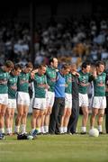 26 June 2010; Dermot Earley, 9, Kildare, stands with his team manager Kieran McGeeney and team mates during the National Anthem. GAA Football All-Ireland Senior Championship Qualifier Round 1, Kildare v Antrim, St Conleth's Park, Newbridge, Co. Kildare. Picture credit: Barry Cregg / SPORTSFILE