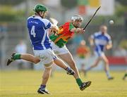 26 June 2010; Cahir Healy, Laois, in action against Craig Doyle, Carlow. GAA Hurling All-Ireland Senior Championship Qualifier Preliminary Round, Carlow v Laois, Dr. Cullen Park, Carlow. Photo by Sportsfile