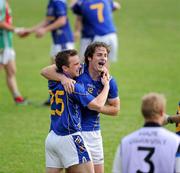 26 June 2010; Longford players Shane Cox, left, and Kevin Mulligan celebrate victory. GAA Football All-Ireland Senior Championship Qualifier Round 1, Longford v Mayo, Pearse Park, Longford. Picture credit: Ray McManus / SPORTSFILE
