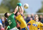 22 May 2016; Diarmuid Murtagh of Roscommon in action against Matthew Murphy of Leitrim during the Connacht GAA Football Senior Championship Quarter-Final, between Roscommon and Leitrim at Páirc Seán Mac Diarmada in Carrick-on-Shannon, Co. Leitrim. Photo by Ramsey Cardy/Sportsfile