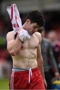 22 May 2016; A dejected Danny Heavron of Derry leaves the field after the game with a Tyrone shirt during the Ulster GAA Football Senior Championship, Quarter-Final, at Celtic Park, Derry.  Photo by Oliver McVeigh/Sportsfile