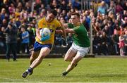 22 May 2016; Diarmuid Murtagh of Roscommon is tackled by Keelan McHugh of Leitrim during the Connacht GAA Football Senior Championship Quarter-Final between Leitrim and Roscommon at Páirc Seán Mac Diarmada in Carrick-on-Shannon, Co. Leitrim. Photo by Ramsey Cardy/Sportsfile