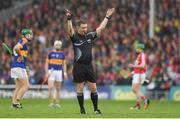 22 May 2016; Referee Barry Kelly signals for the use of hawk-eye during the Munster GAA Hurling Senior Championship Quarter-Final match between Tipperary and Cork at Semple Stadium in Thurles, Co. Tipperary. Photo by Stephen McCarthy/Sportsfile