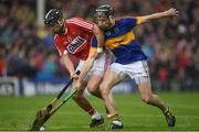 22 May 2016; Killian Burke of Cork in action against John McGrath of Tipperary during the Munster GAA Hurling Senior Championship Quarter-Final match between Tipperary and Cork at Semple Stadium in Thurles, Co. Tipperary. Photo by Stephen McCarthy/Sportsfile