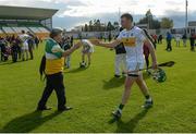 22 May 2016; Offaly supporter Mick McDonagh greets Joe Bergin, who scored two second half goals, after the Leinster GAA Hurling Championship Qualifier, Round 3, between Offaly and Kerry at O'Connor Park, Tullamore, Co. Offaly.  Photo by Piaras Ó Mídheach/Sportsfile