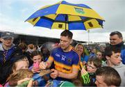 22 May 2016; Seamus Callanan of Tipperary signs autographs after his side's victory in the Munster GAA Hurling Senior Championship Quarter-Final match between Tipperary and Cork at Semple Stadium in Thurles, Co. Tipperary. Photo by Stephen McCarthy/Sportsfile