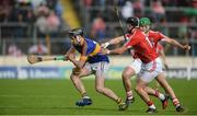 22 May 2016; John McGrath of Tipperary in action against Killian Burke of Cork during the Munster GAA Hurling Senior Championship Quarter-Final match between Tipperary and Cork at Semple Stadium in Thurles, Co. Tipperary. Photo by Dáire Brennan/SPORTSFILE