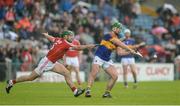 22 May 2016; John O'Dwyer of Tipperary in action against Christopher Joyce of Cork during the Munster GAA Hurling Senior Championship Quarter-Final match between Tipperary and Cork at Semple Stadium in Thurles, Co. Tipperary. Photo by Dáire Brennan/SPORTSFILE