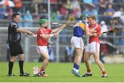 22 May 2016; Cathal Barrett of Tipperary tussles with Daniel Kearney and Bill Cooper, right, of Cork during the Munster GAA Hurling Senior Championship Quarter-Final match between Tipperary and Cork at Semple Stadium in Thurles, Co. Tipperary. Photo by Stephen McCarthy/Sportsfile