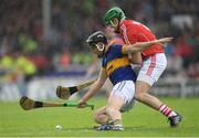 22 May 2016; John McGrath of Tipperary in action against William Egan of Cork during the Munster GAA Hurling Senior Championship Quarter-Final match between Tipperary and Cork at Semple Stadium in Thurles, Co. Tipperary. Photo by Stephen McCarthy/Sportsfile