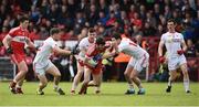 22 May 2016; Karl McKaigue of Derry in action against Kieran McGeary, Connor McAliskey and Sean Cavanagh of Tyrone during the Ulster GAA Football Senior Championship, Quarter-Final between Derry and Tyrone at Celtic Park, Derry.  Photo by Oliver McVeigh/Sportsfile