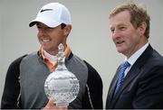 22 May 2016; Rory McIlroy of Northern Ireland with his trophy, along with an taoiseach Enda Kenny T.D., after winning the Dubai Duty Free Irish Open Golf Championship at The K Club in Straffan, Co. Kildare. Photo by Diarmuid Greene/Sportsfile