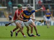 22 May 2016; John McGrath of Tipperary in action against Aidan Walsh of Cork during the Munster GAA Hurling Senior Championship Quarter-Final match between Tipperary and Cork at Semple Stadium in Thurles, Co. Tipperary. Photo by Dáire Brennan/SPORTSFILE