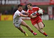 22 May 2016; Eoghan Brown of Derry in action against Darren McCurry of Tyrone during the Ulster GAA Football Senior Championship, Quarter-Final, at Celtic Park, Derry.  Photo by Sportsfile