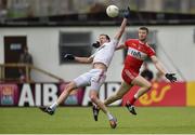 22 May 2016; Colm Kavanagh of Tyrone in action against Niall Holly of Derry during the Ulster GAA Football Senior Championship, Quarter-Final, at Celtic Park, Derry.  Photo by Sportsfile