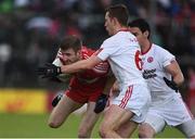 22 May 2016; Niall Holly of Derry in action against Niall Sludden and Mattie Donnelly of Tyrone during the Ulster GAA Football Senior Championship, Quarter-Final, at Celtic Park, Derry. Photo by Oliver McVeigh/Sportsfile