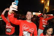 22 May 2016; Nick Scallen, from Stillorgan, Dublin, takes a selfie after finishing the 2016 Virgin Media Night Run in Dublin City Centre, Dublin.  Photo by Seb Daly/Sportsfile