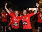 22 May 2016; Patricia Hand, left, and Olivia Lane O'Brien, from Swords, Co. Dublin, celebrate after finishing the 2016 Virgin Media Night Run in Dublin City Centre, Dublin.  Photo by Seb Daly/Sportsfile