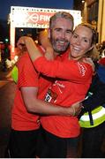 22 May 2016; Patrick Kirwan, left, and Lee-Anne Maye, right, celebrate after finishing the 2016 Virgin Media Night Run in Dublin City Centre, Dublin.  Photo by Seb Daly/Sportsfile