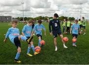 23 May 2016; Republic of Ireland's Callum O'Dowda coaches school children from Scoil Choilmcille, Mount Hanover, Duleek, Meath, during a training session. SPAR treated this year’s SPAR FAI Primary School 5’s winners to a training session with Republic of Ireland players Jeff Hendrick, Stephen Quinn and Callum O'Dowda at the team training camp in the National Sports Campus in advance of the Republic of Ireland vs Netherlands game on Friday. SPAR is the Official Convenience Retail Partner of the FAI. National Sports Campus, Abbotstown, Dublin. Photo by Piaras Ó Mídheach/Sportsfile