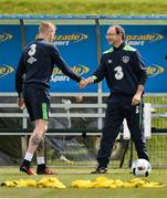 23 May 2016; Martin O'Neill, Manager of the Republic of Ireland, greets James McClean during squad training in the National Sports Campus, Abbotstown, Dublin. Photo by David Maher/Sportsfile