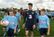 23 May 2016; SPAR treated this year’s SPAR FAI Primary School 5’s winners to a training session with Republic of Ireland players Jeff Hendrick, Stephen Quinn and Callum O'Dowda at the team training camp in the National Sports Campus in advance of the Republic of Ireland vs Netherlands game on Friday. SPAR is the Official Convenience Retail Partner of the FAI. Pictured is Republic of Ireland player Callum O'Dowda with school children during the training session. National Sports Campus, Abbotstown, Dublin. Photo by Piaras Ó Mídheach/Sportsfile