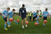 23 May 2016; Republic of Ireland's Callum O'Dowda coaches school children from Scoil Choilmcille, Mount Hanover, Duleek, Meath, during a training session. SPAR treated this year’s SPAR FAI Primary School 5’s winners to a training session with Republic of Ireland players Jeff Hendrick, Stephen Quinn and Callum O'Dowda at the team training camp in the National Sports Campus in advance of the Republic of Ireland vs Netherlands game on Friday. SPAR is the Official Convenience Retail Partner of the FAI. National Sports Campus, Abbotstown, Dublin. Photo by Piaras Ó Mídheach/Sportsfile