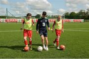 23 May 2016; Republic of Ireland's Callum O'Dowda coaches school children Caoimhe Riordan and Leah Donovan, right, from Dromtrasna NS, Abbeyfeale, Limerick, during a training session. SPAR treated this year’s SPAR FAI Primary School 5’s winners to a training session with Republic of Ireland players Jeff Hendrick, Stephen Quinn and Callum O'Dowda at the team training camp in the National Sports Campus in advance of the Republic of Ireland vs Netherlands game on Friday. SPAR is the Official Convenience Retail Partner of the FAI. National Sports Campus, Abbotstown, Dublin. Photo by Piaras Ó Mídheach/Sportsfile